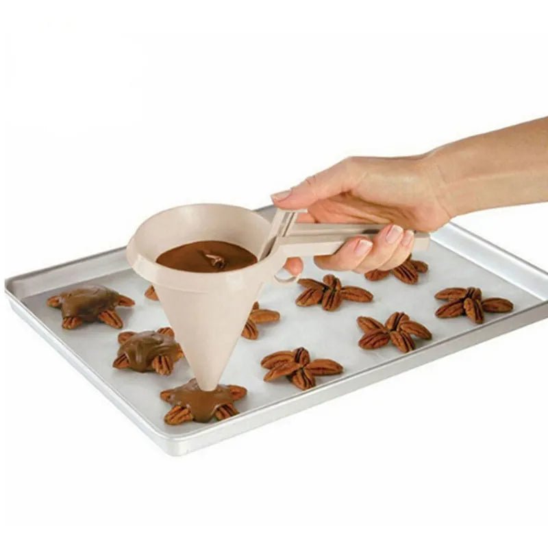 entonnoir à piston _-_pour faire des chocolats